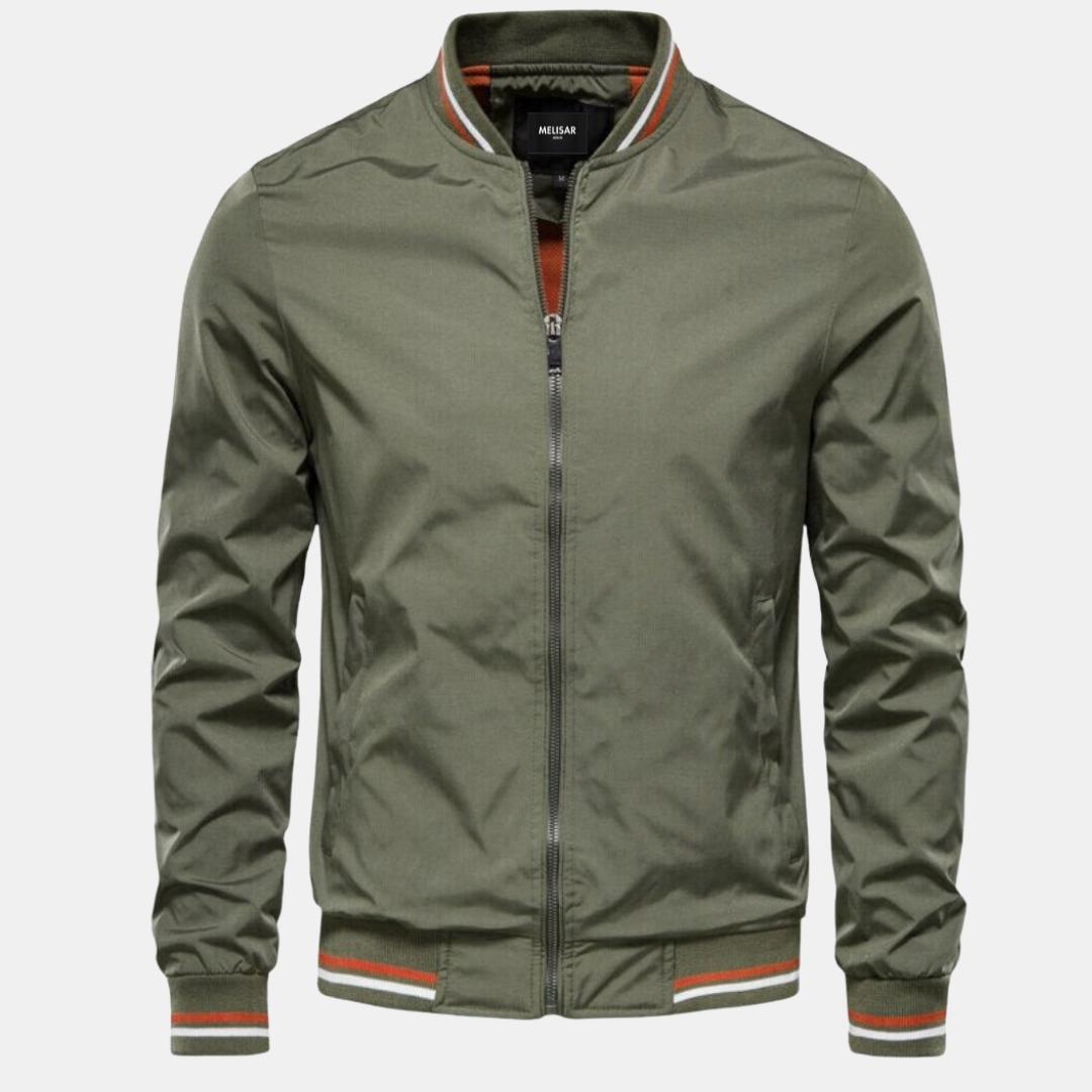 Men's lightweight navy bomber jacket with ribbed cuffs, clean Nordic silhouette, versatile fall essential
