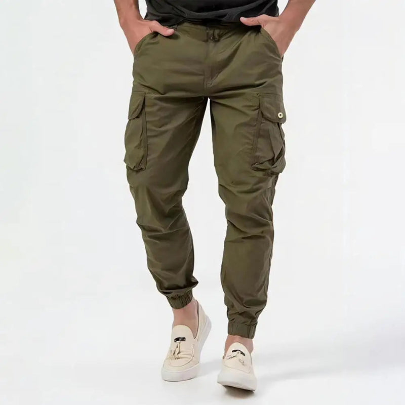 Black slim tapered cargo joggers with built-in stretch, side pockets, lightweight fabric for urban athletes