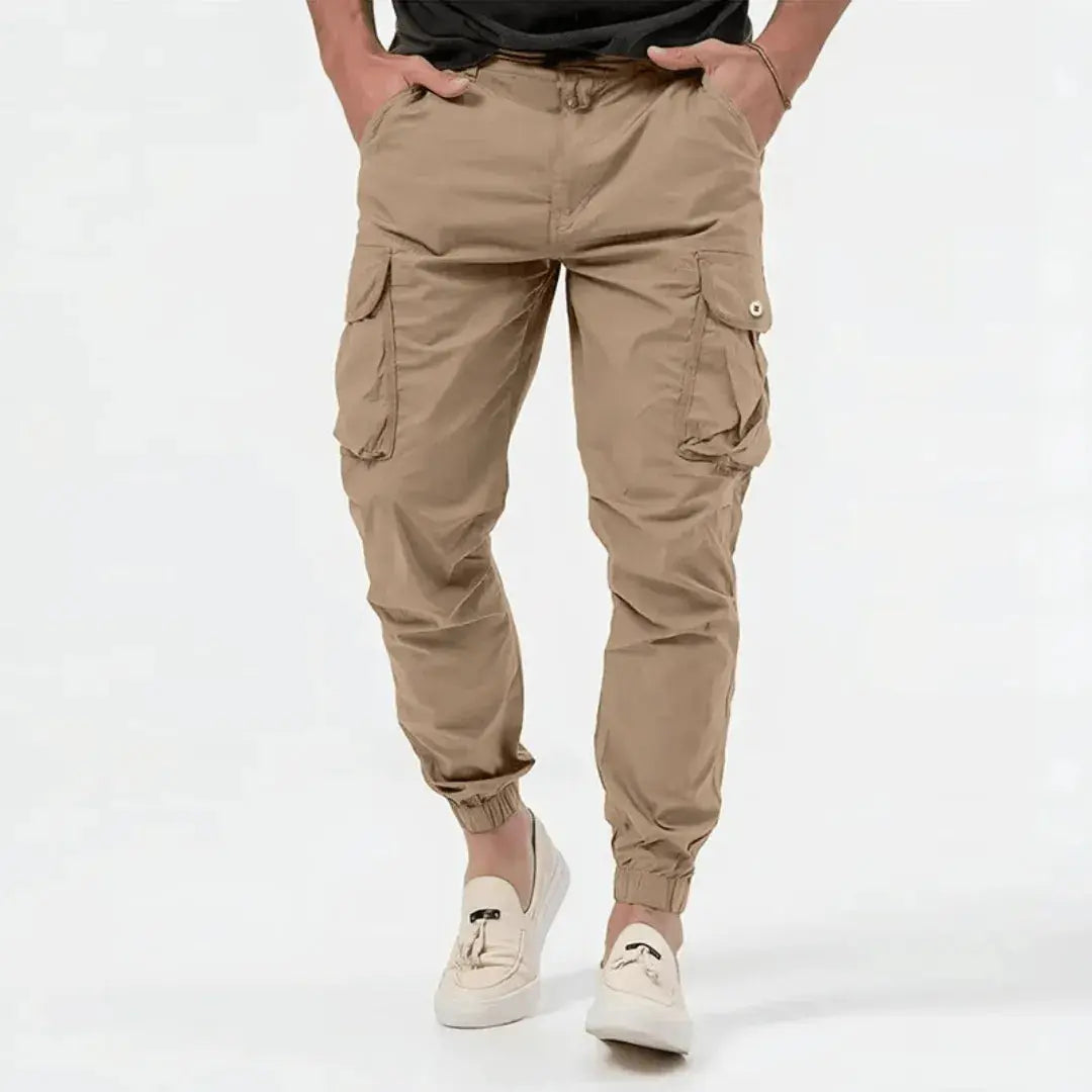 Black cargo joggers slim tapered cut 4-way stretch cotton with multi-pocket utility design