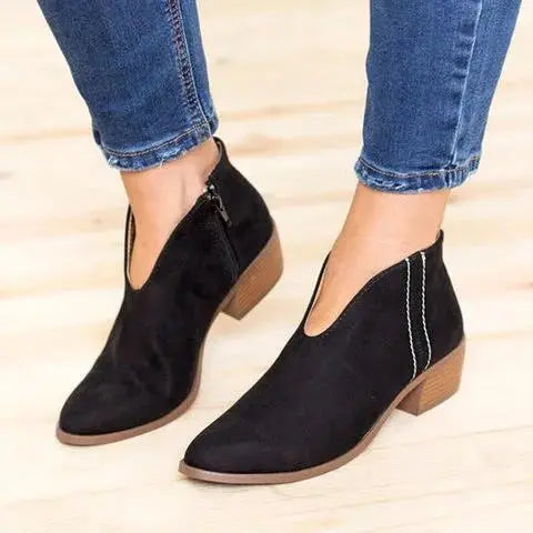 Black V-cut ankle boots for women in faux leather, sleek silhouette with all-day comfort design