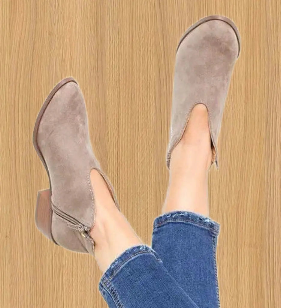 Black V-cut ankle boots for women in faux leather, sleek elegant silhouette for all-day comfort