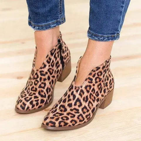Black V-cut ankle boots for women, faux leather, sleek elegant silhouette with all-day comfort design