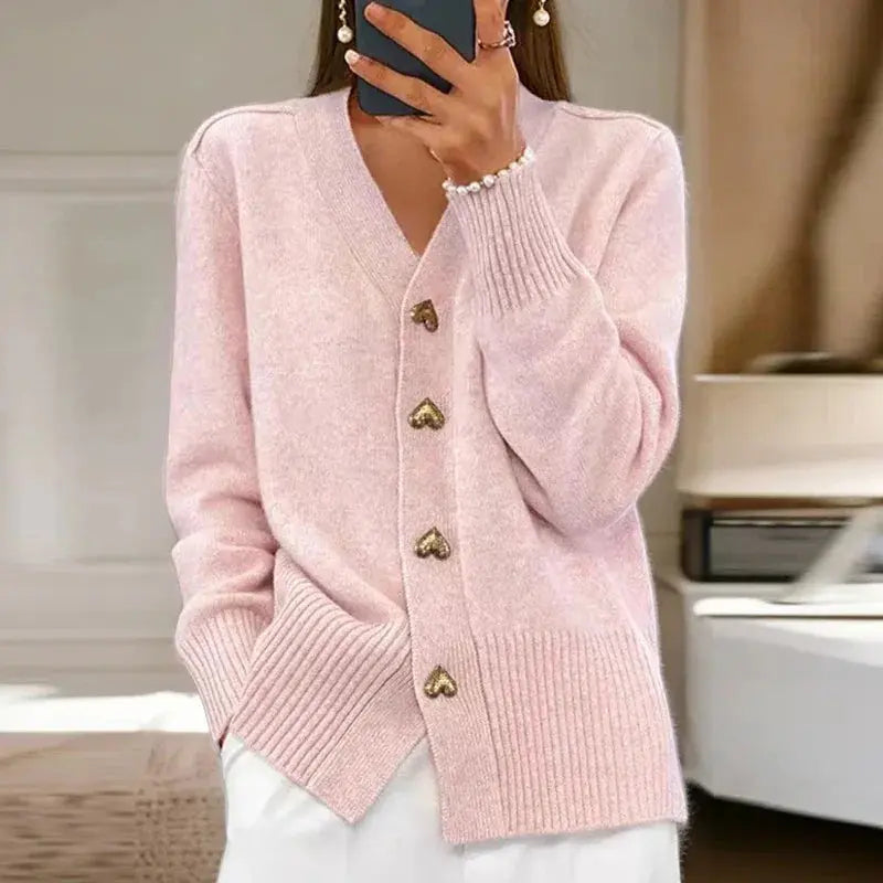 Women's cozy V-neck cardigan sweater, versatile layering piece with distinctive button details