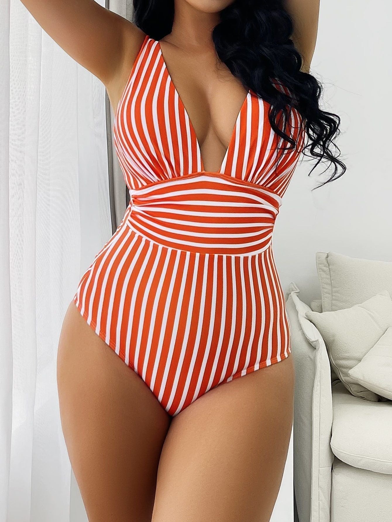 Women's black white striped retro V-neck one-piece swimsuit with slimming sculpting waist panel