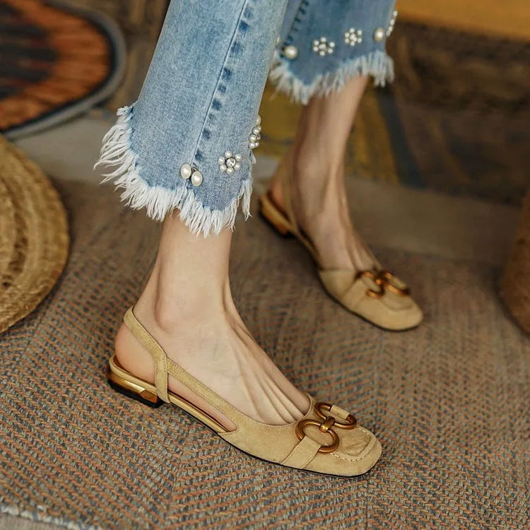 Women's black slingback flats open-back sculpted fit with bold gold chain accent everyday chic