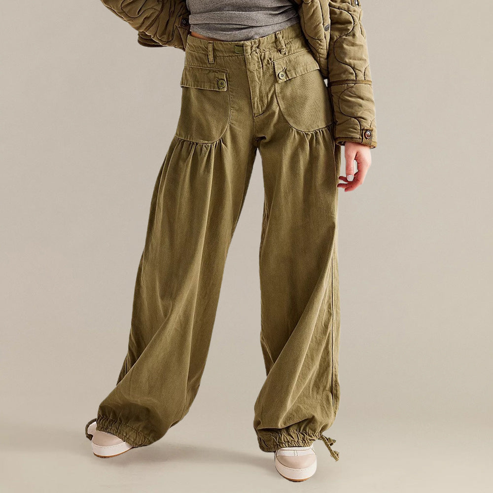 Light wash wide-leg loose jeans with statement front pockets and cinched drawstring hems for streetwear