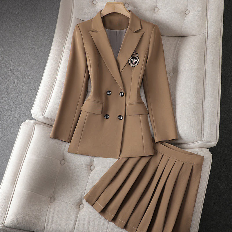 Ivory double-breasted blazer and pleated mini skirt two-piece set, modern tailored couture silhouette