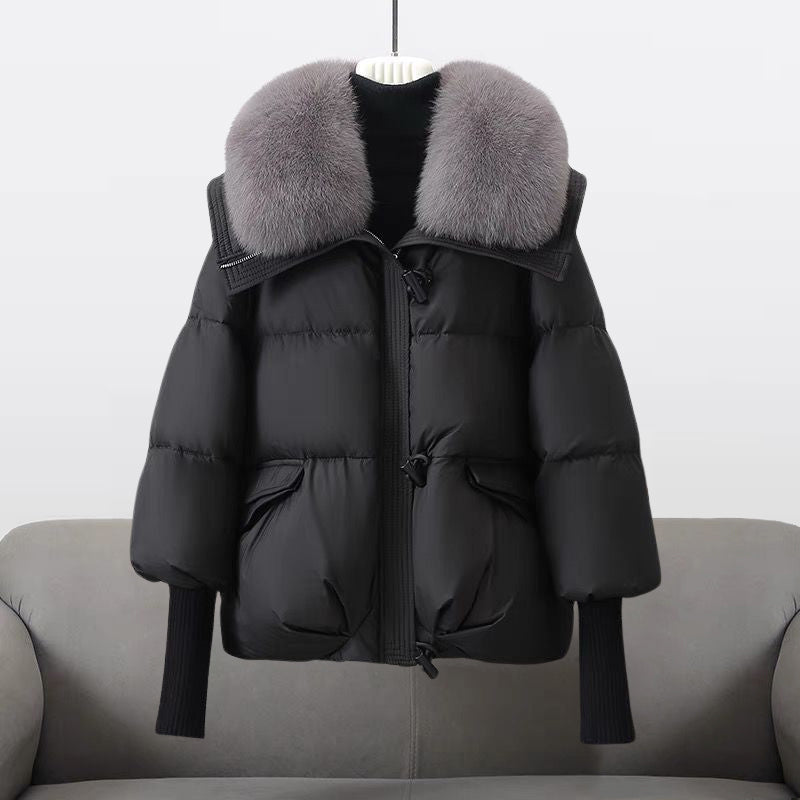 Women's black quilted puffer jacket relaxed fit with plush fur collar and toggle front closure