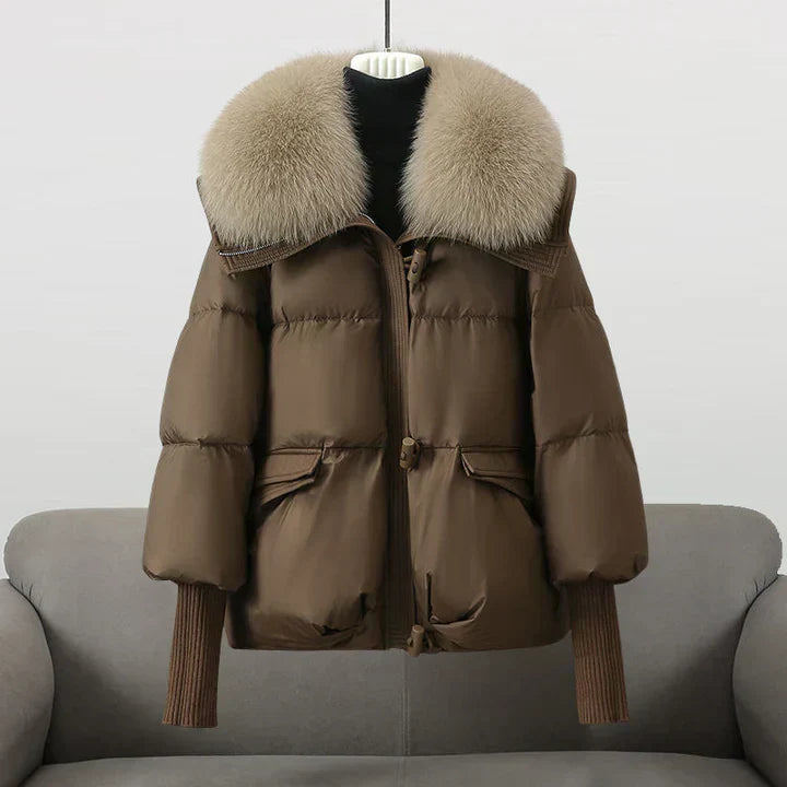 Women's short black puffer jacket with sleek contemporary fit and compact silhouette for winter