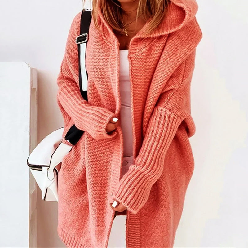 Women's oversized loose knit hooded cardigan in cozy neutral tones, knee-length relaxed silhouette