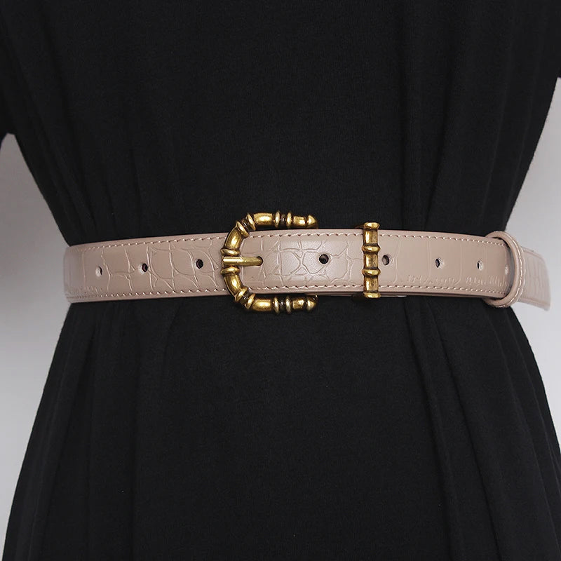 Women's gold baroque leather belt crocodile texture cinched waist statement sculptural buckle bold luxury