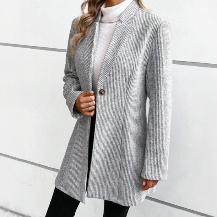 Women's mid-length single-breasted jacquard coat with intricate pattern, structured silhouette, luxury outerwear