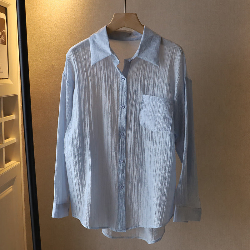 Women's semi-sheer ultra-light relaxed fit shirt in versatile neutral polyester blend wardrobe essential