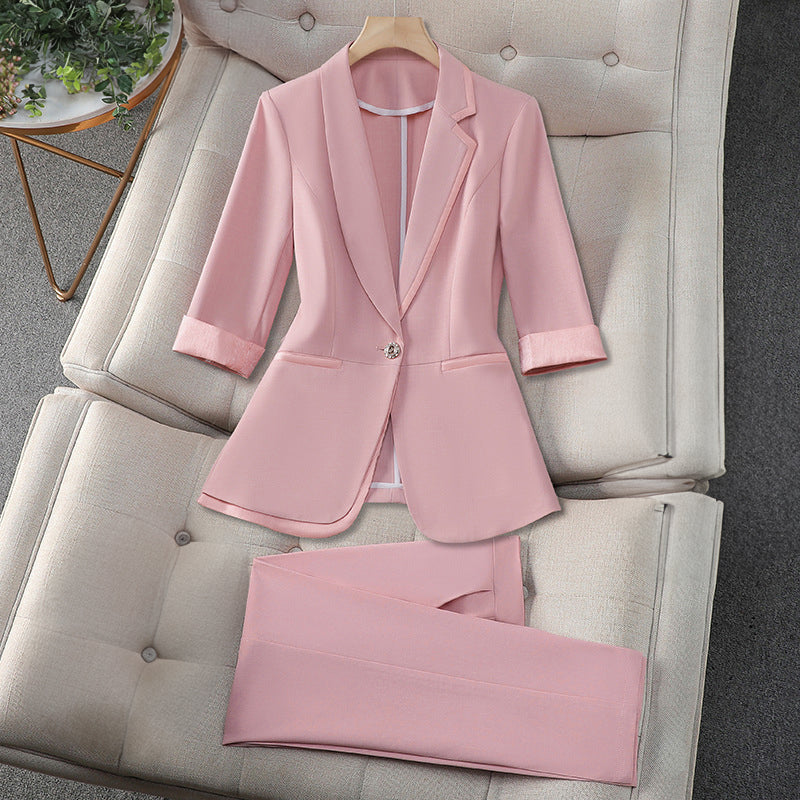 Ivory tailored blazer and pants formal set with classic lapel collar, polished professional silhouette