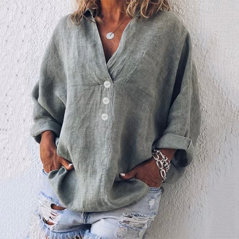 Women's white linen blend blouse exaggerated silhouette dropped shoulders asymmetrical button placket