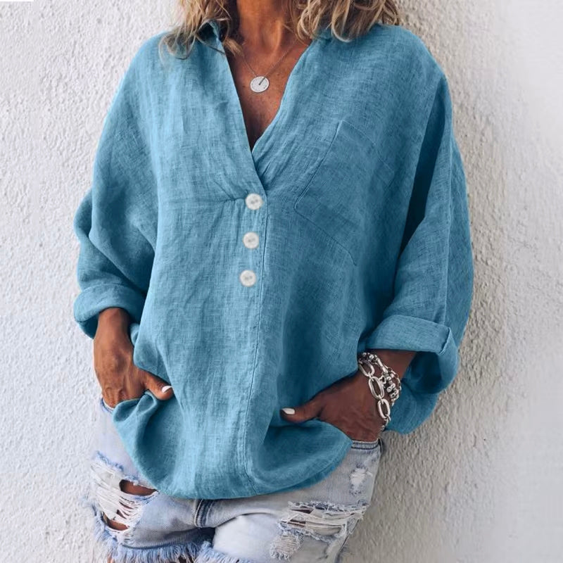 Women's white linen blouse exaggerated silhouette asymmetrical button placket dropped shoulders Valentina Rossi