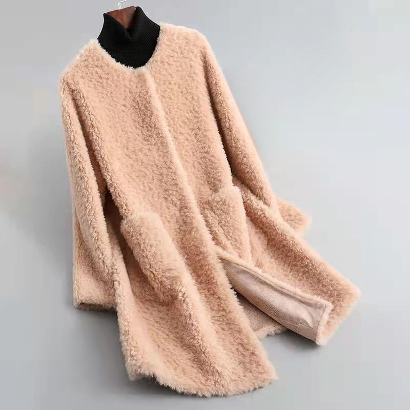 Women's ivory faux shearling coat with satin-like shell, plush texture, and luxurious velvet-soft finish