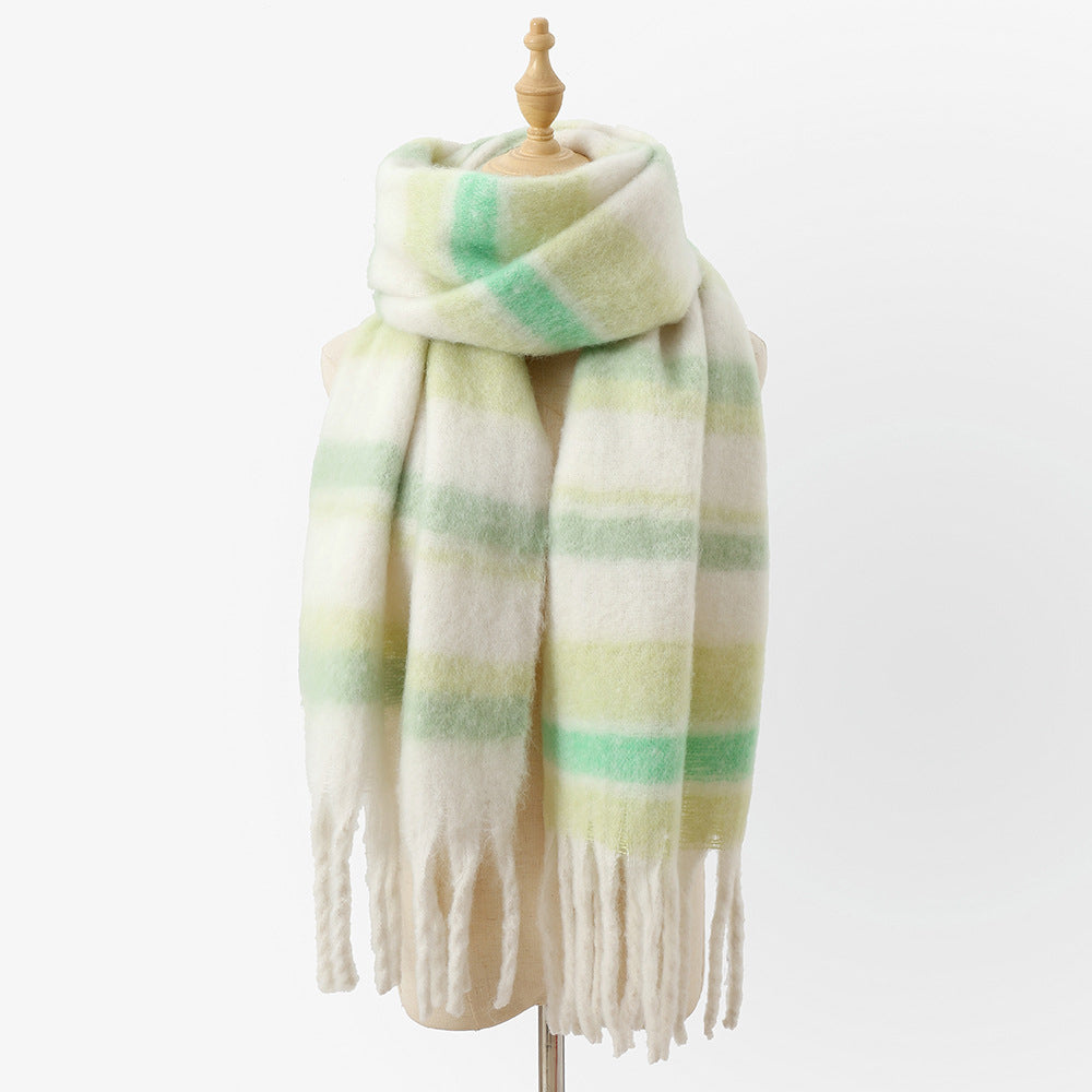Women's oversized striped fringe scarf in neutral tones with long fringe detail for cozy layering