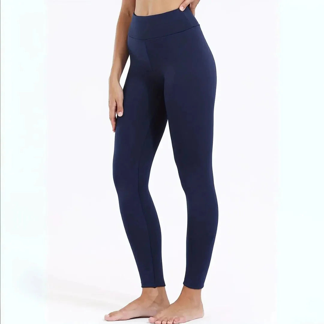 Women's black high-waist thermal fleece-lined leggings with tummy control for cold-weather comfort