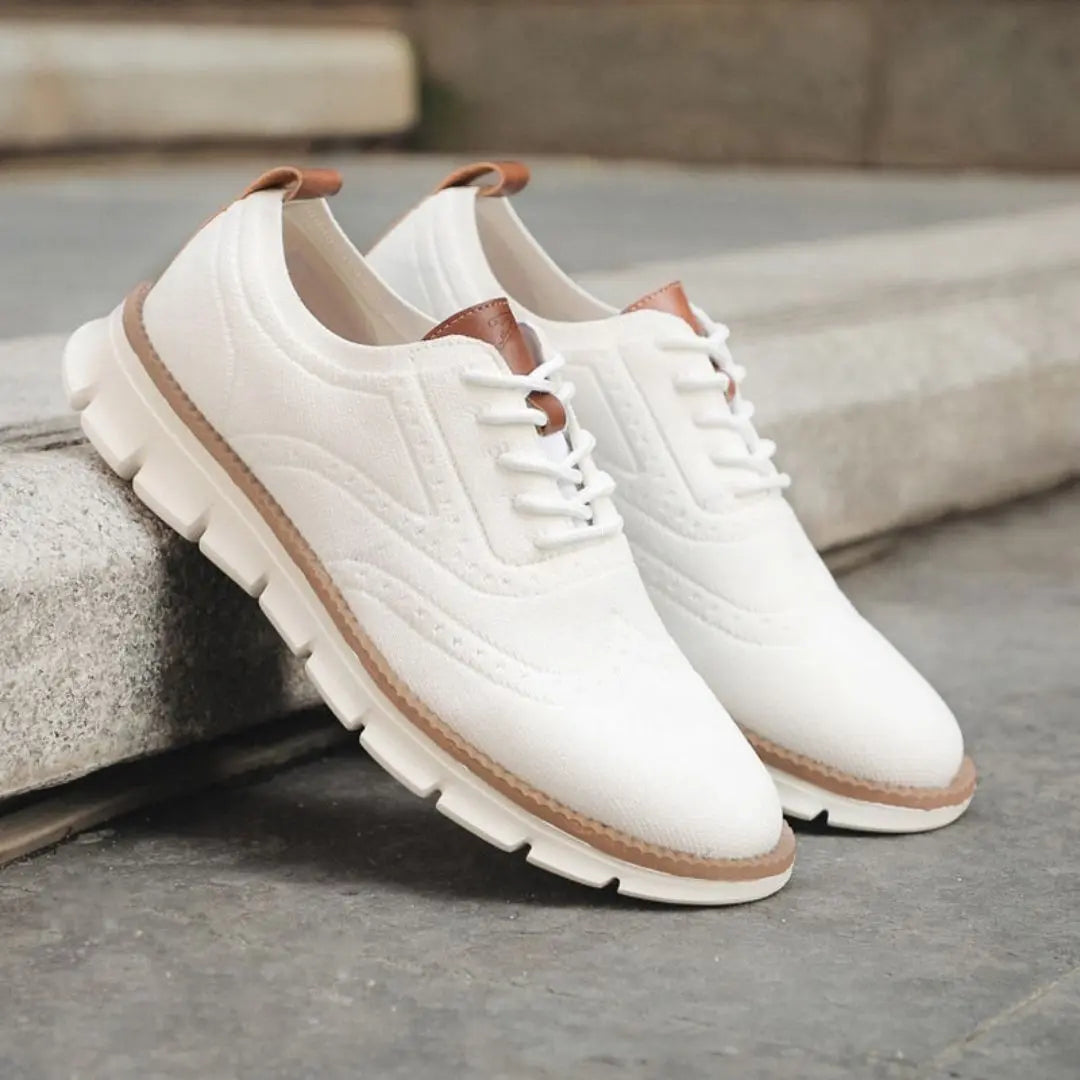 Men's brown leather Oxford sneakers with wingtip detailing and cushioned urban comfort sole