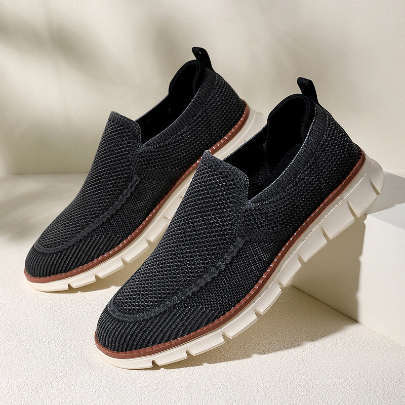 Sleek black knit slip-on loafers with cushioned EVA sole and pull tab for all-day comfort