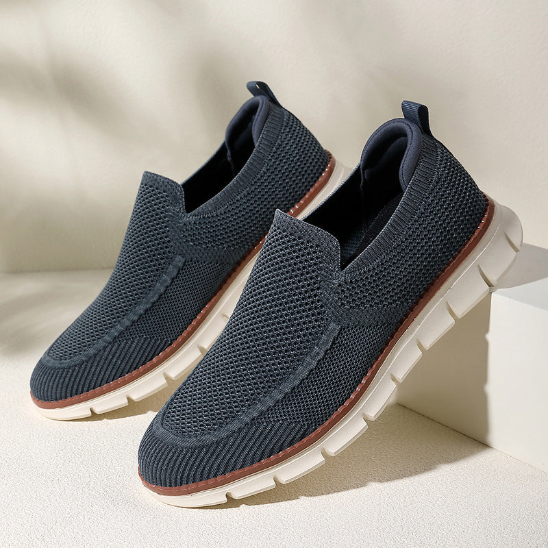 Sleek black knit loafers slip-on style cushioned EVA sole breathable upper all-day comfort