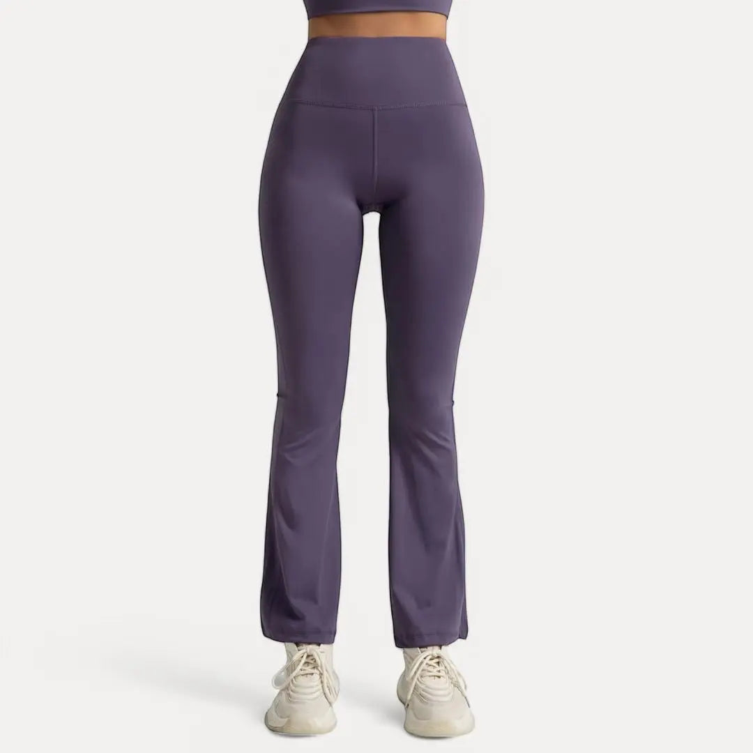 Black high-waist flare leggings with ultra-stretch moisture-wicking fabric and sculpted yoga silhouette