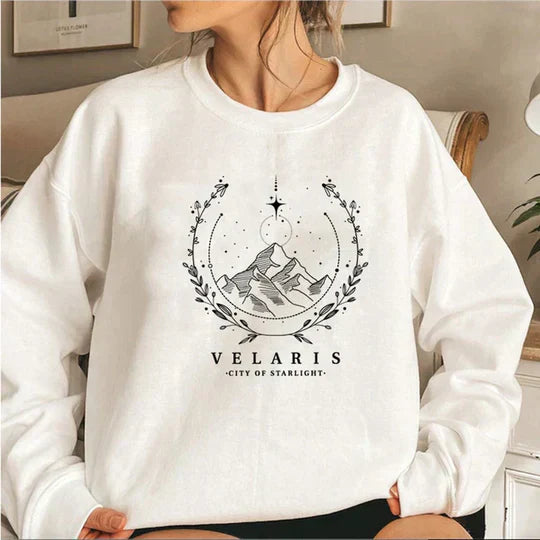 Velaris Leva relaxed-fit soft knit sweater in neutral tone, cozy casual style with contemporary silhouette