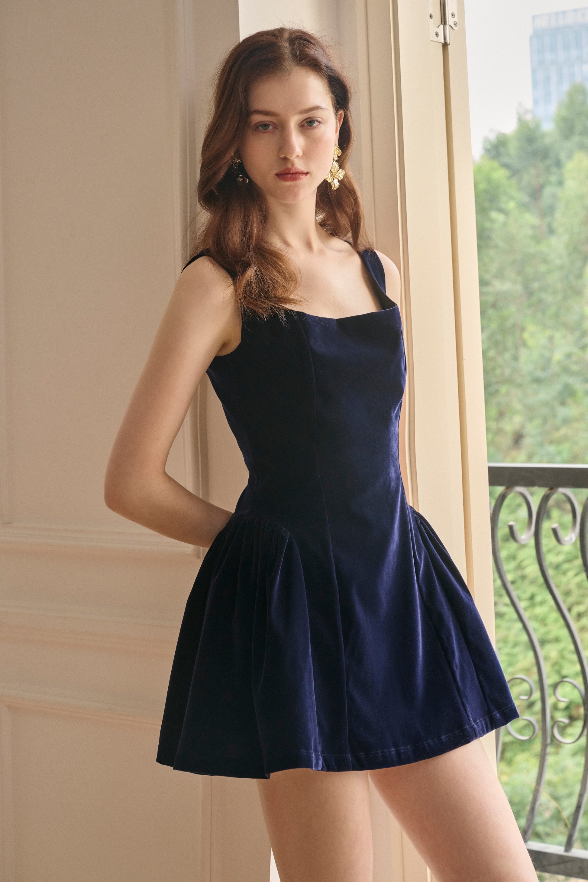 Burgundy velvet square neck mini dress with fitted bodice and structured silhouette for women