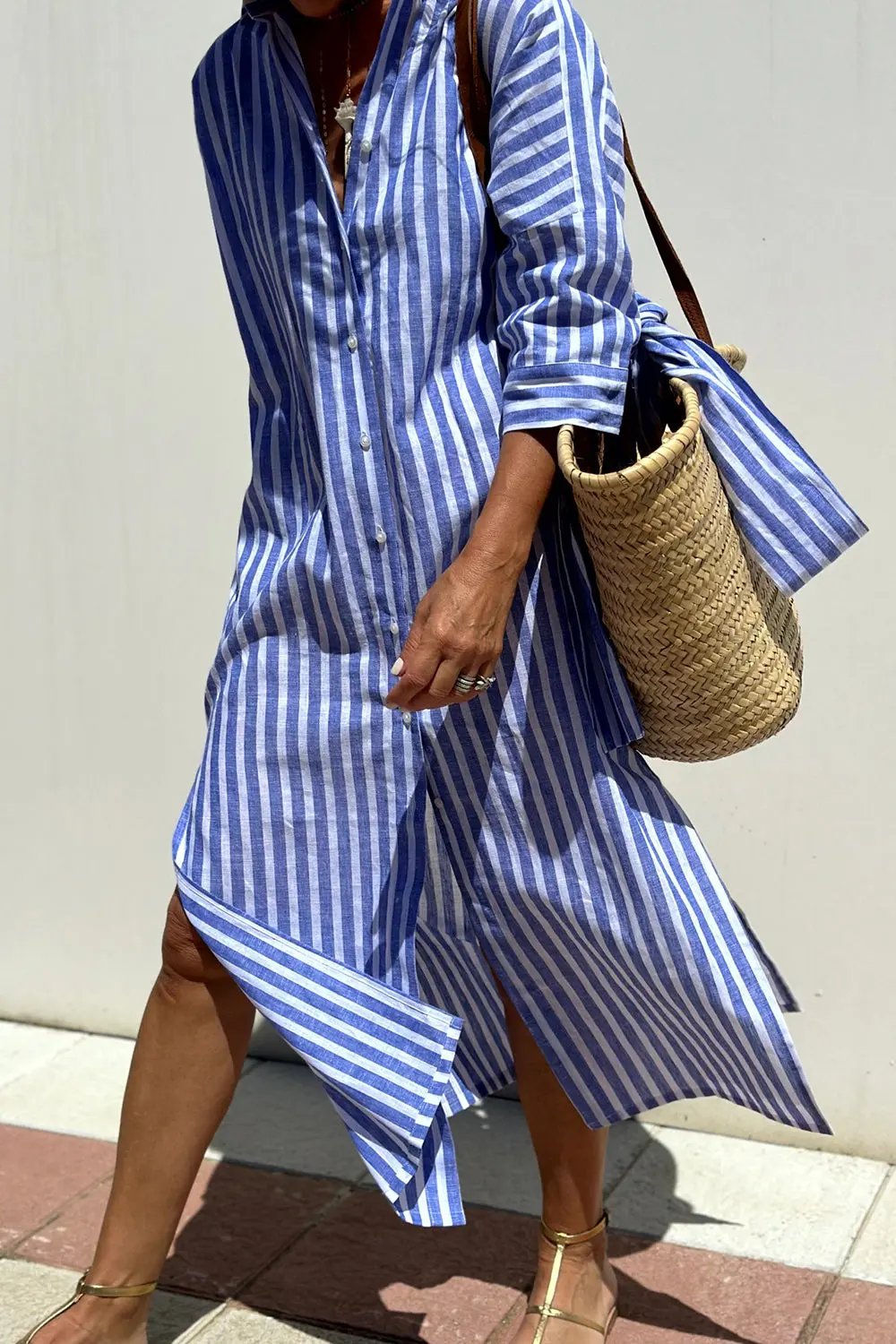 Women's white navy vertical striped oversized shirt dress with relaxed silhouette and button-front