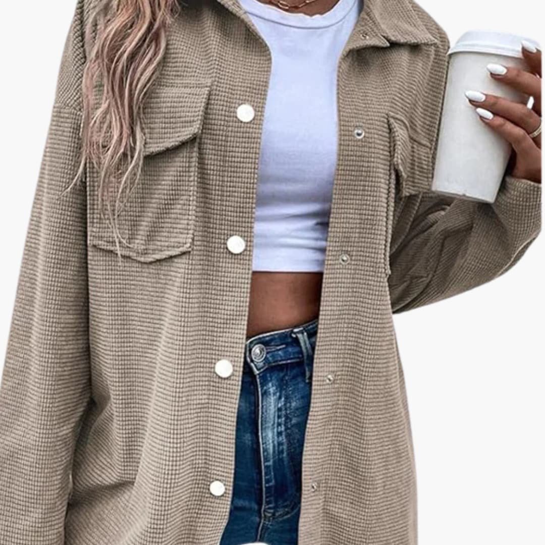 Women's brown ribbed shirt jacket with button closure, front pockets, and structured straight silhouette