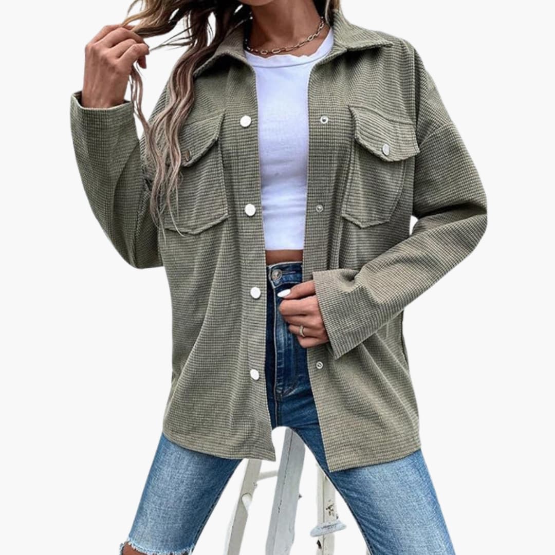 Women's brown ribbed shirt jacket with button closure, front pockets, and structured straight silhouette