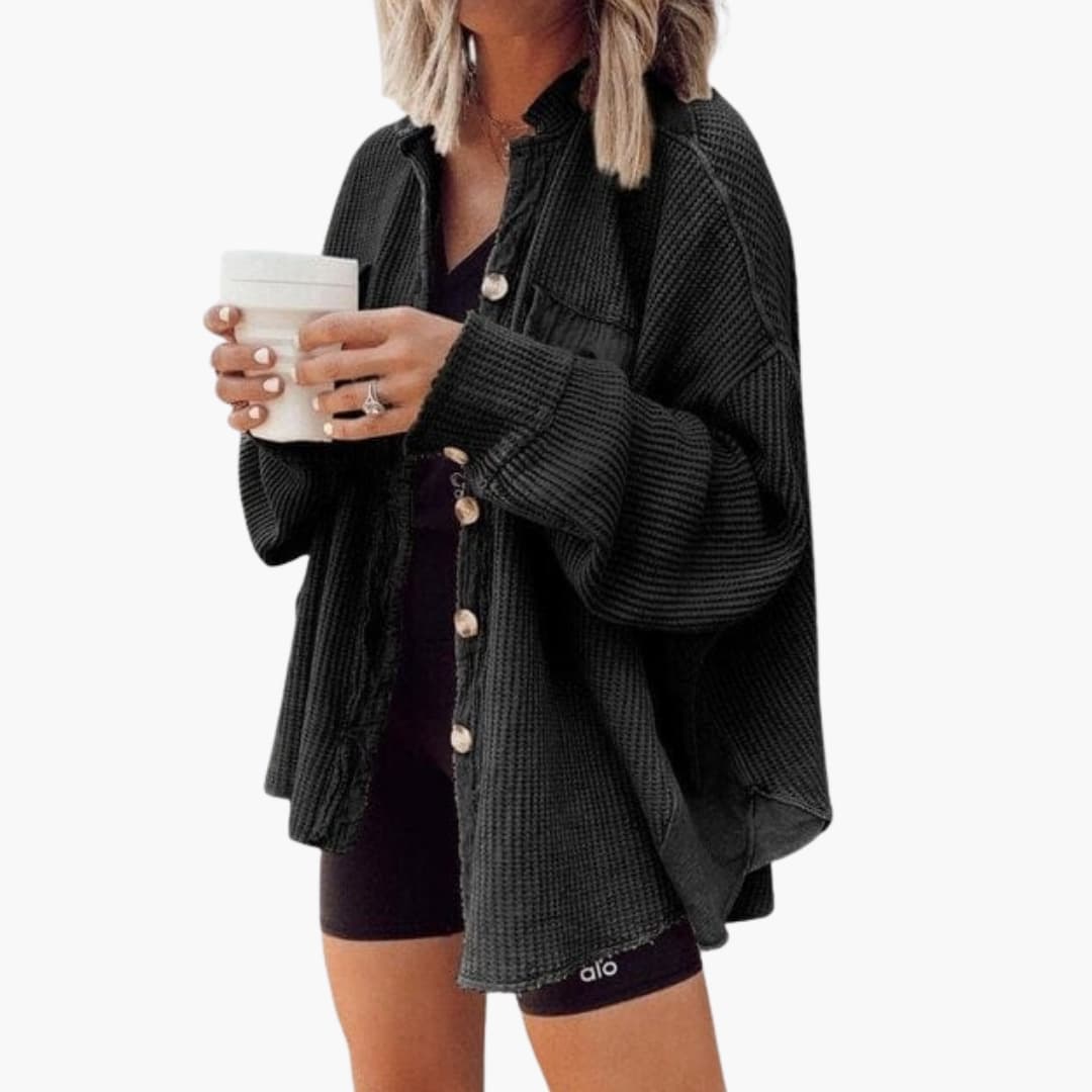 Women's oversized textured thick knit shirt jacket with full button closure for effortless layering