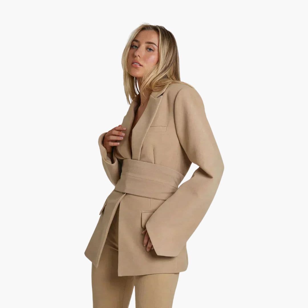 Women's structured blazer jacket with wide sleeves, tie belt waist, notched collar, professional chic fit
