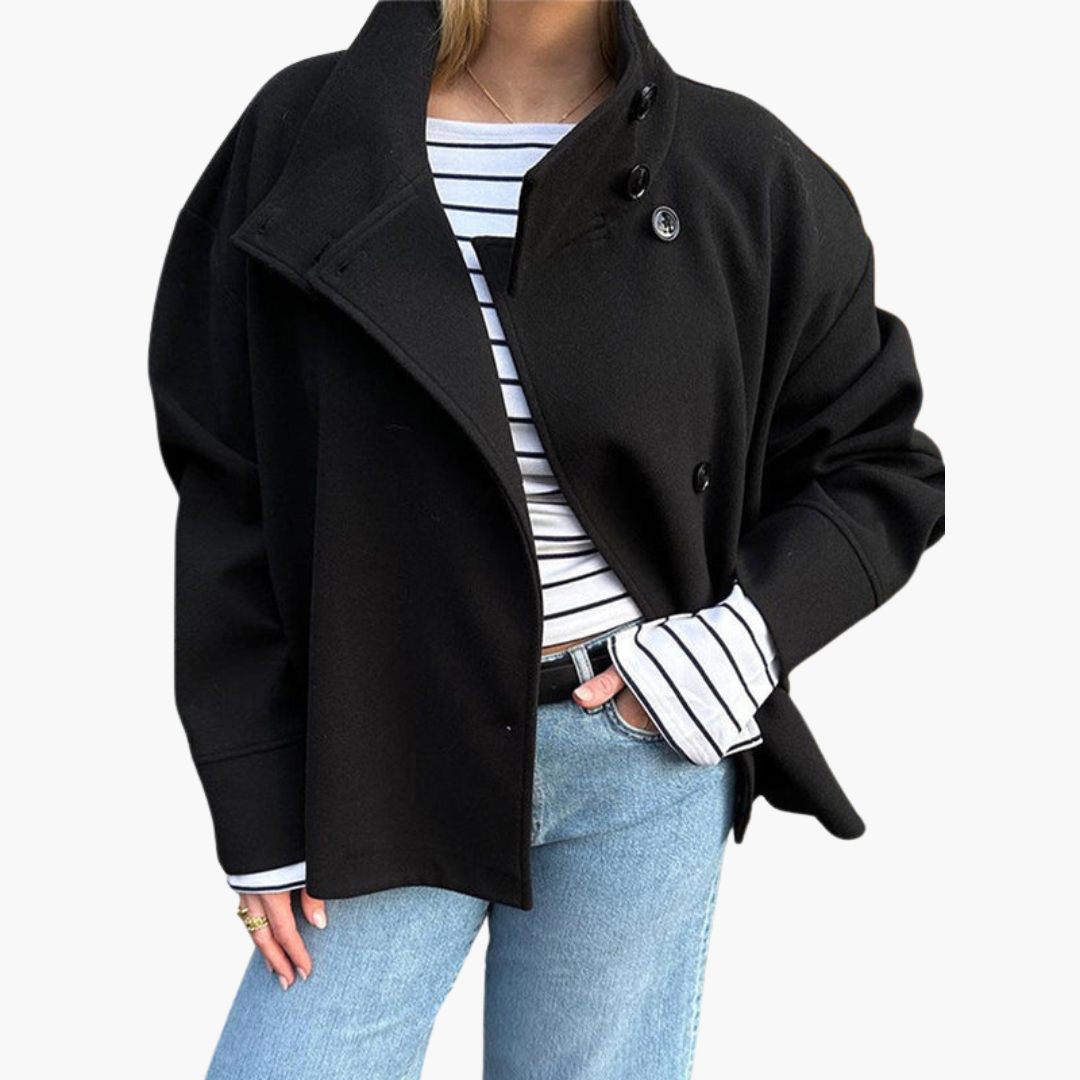Women's short tailored jacket with wide lapel collar, front button closure, minimal silhouette
