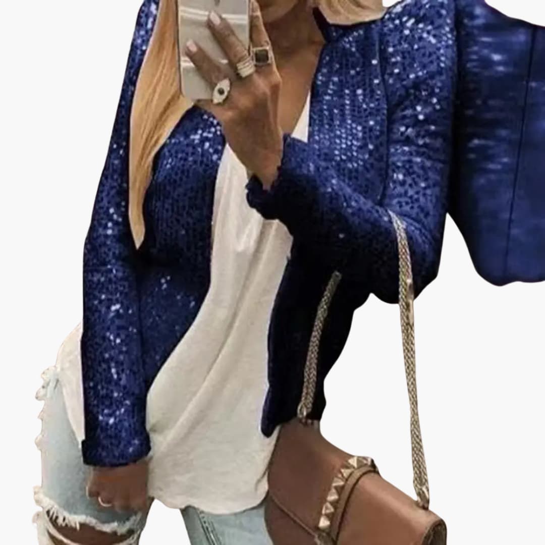 Women's silver sequin cropped jacket with front opening, long sleeves, and glam sparkle finish