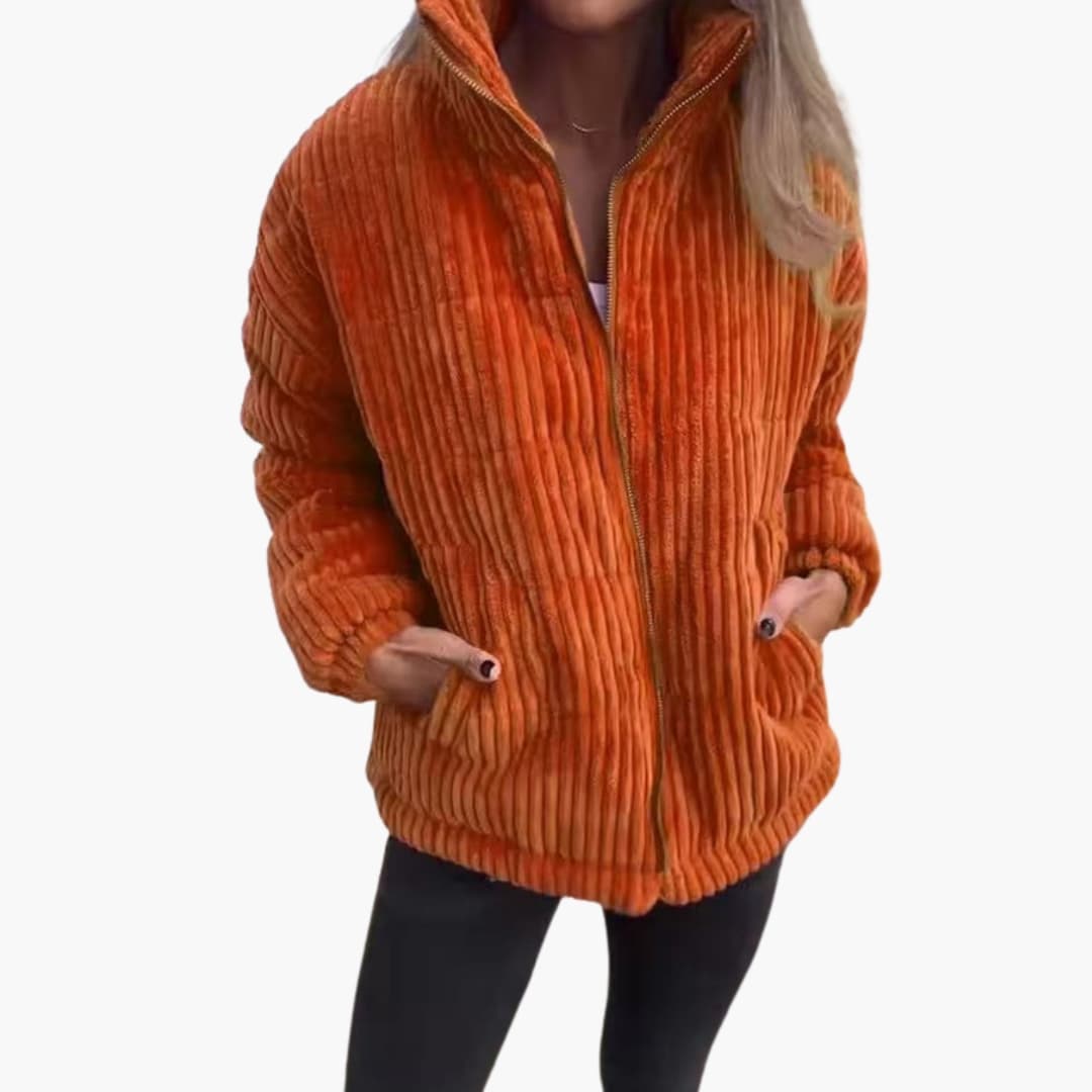 Women's green ribbed winter jacket with full-length zipper closure for cold weather warmth