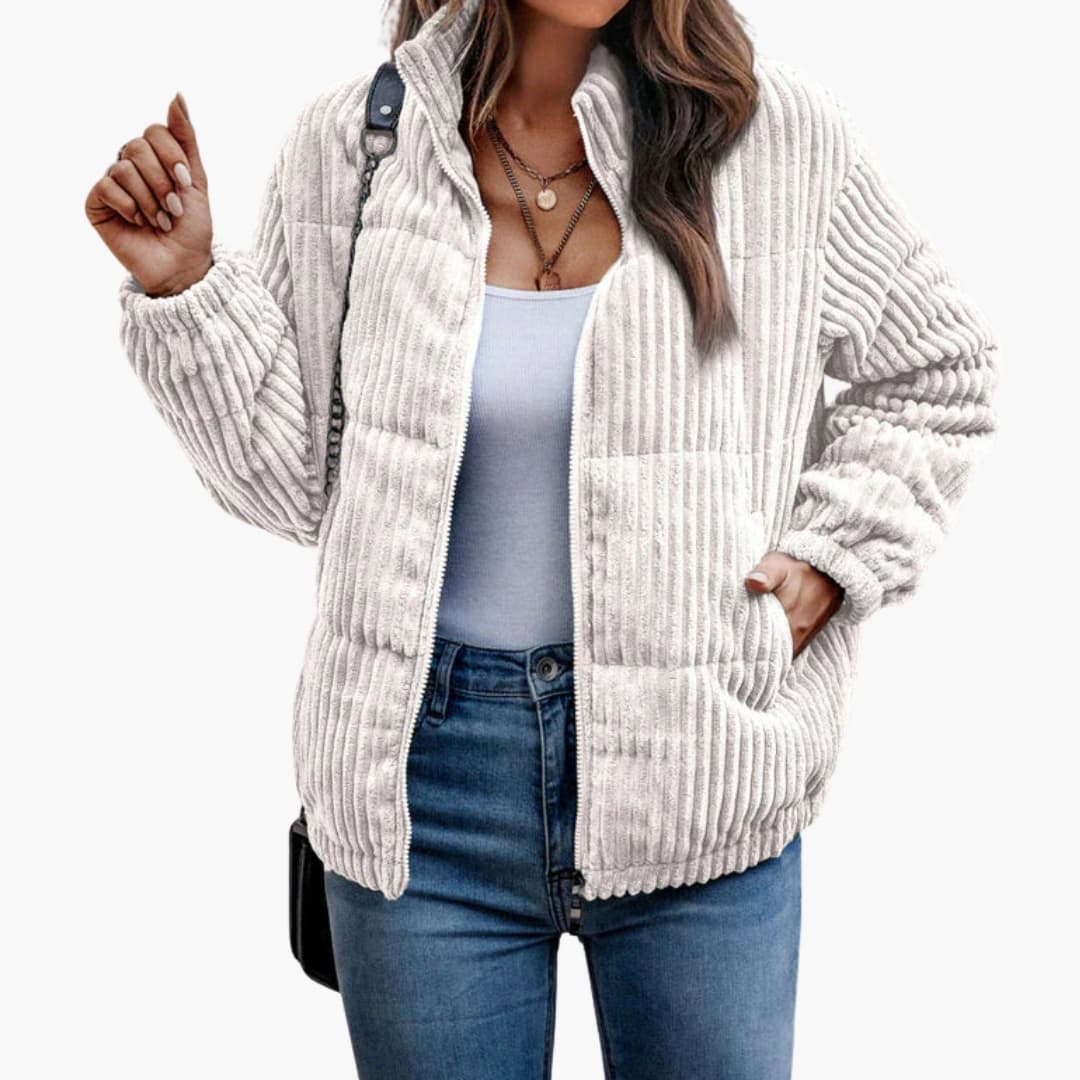 Women's green ribbed winter jacket with full-length zipper closure for cold weather warmth