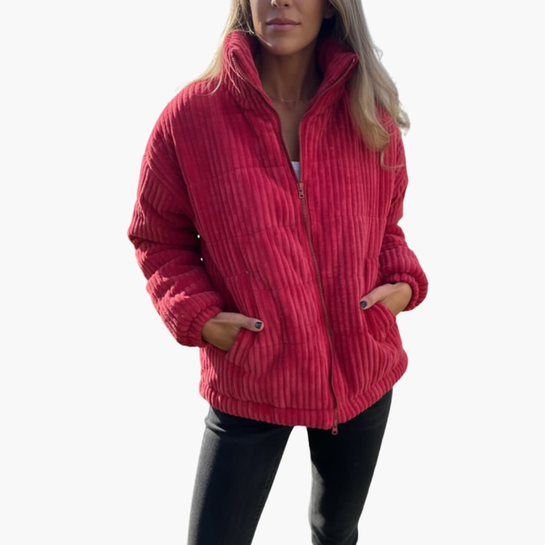 Women's green ribbed winter jacket with full-length zipper closure, structured fit for cold weather