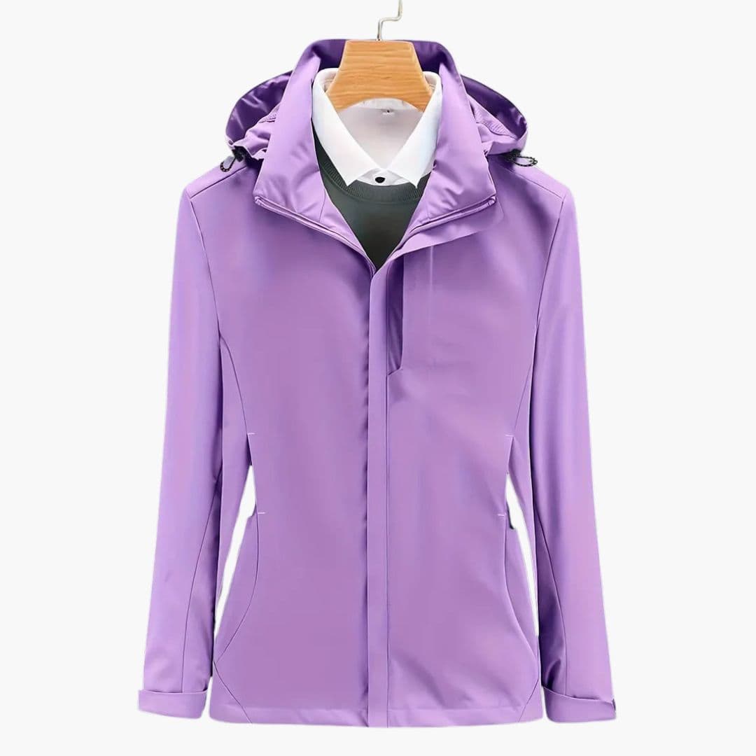 Women's hooded ski jacket with zippered pockets and adjustable hood cords for cold winter slopes