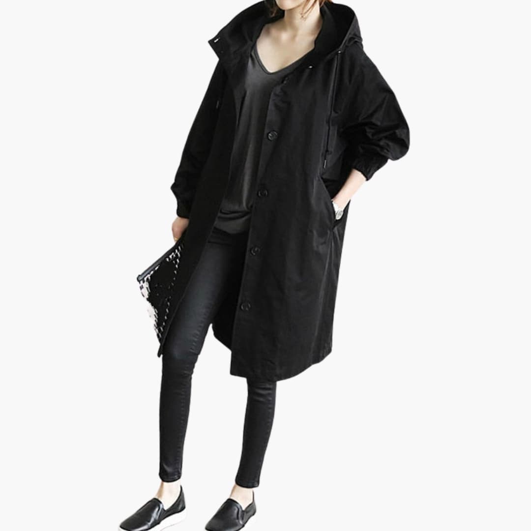 Women's versatile outdoor jacket with adjustable hood, front pockets, structured neckline, clean texture