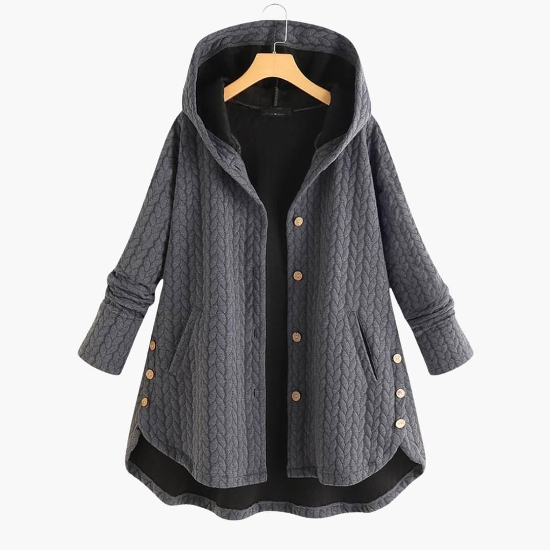 Women's black quilted fitted jacket with front zip closure and side pockets for smart mid-season wear