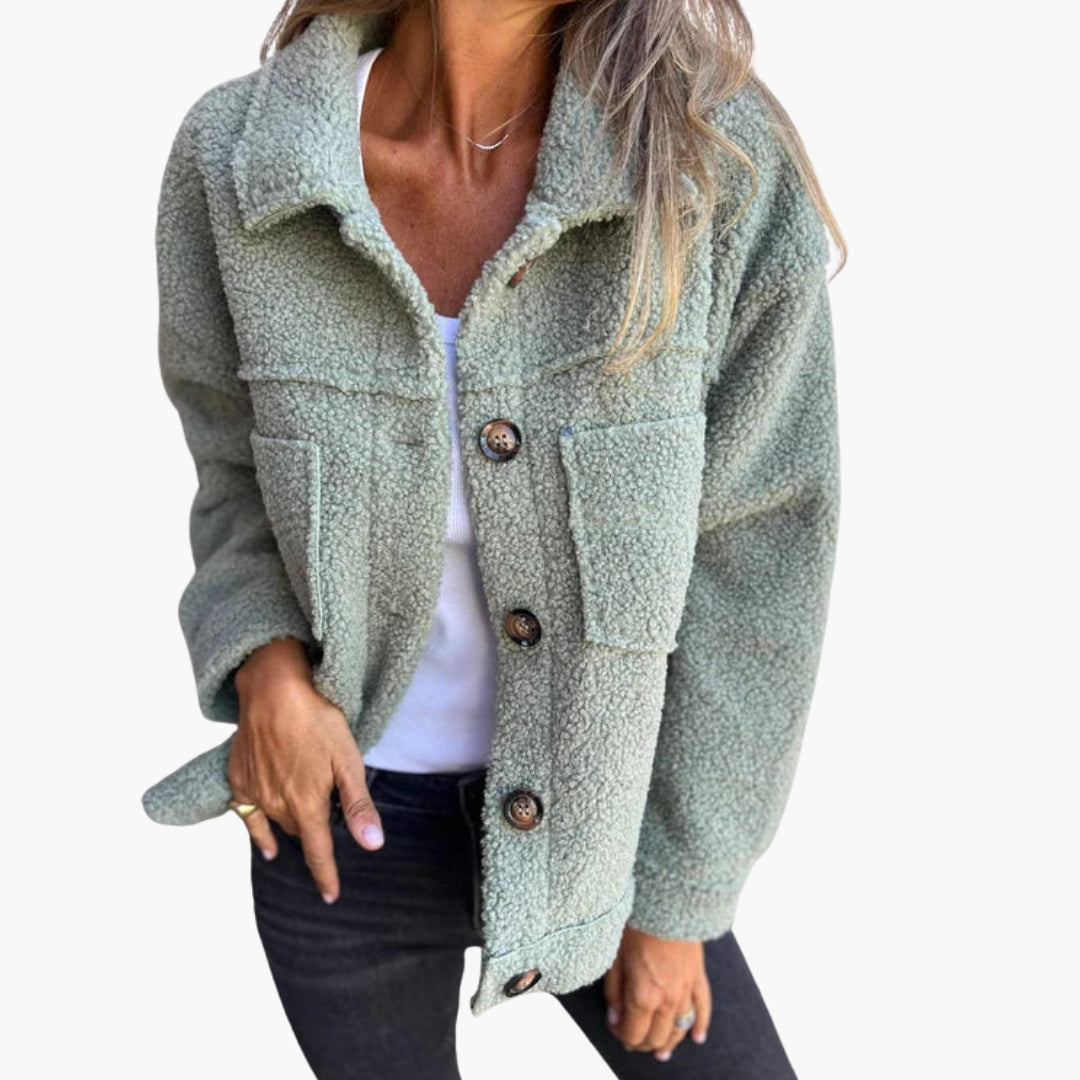 Women's wool blend jacket with notched collar, button-front closure, patch pockets, structured fit