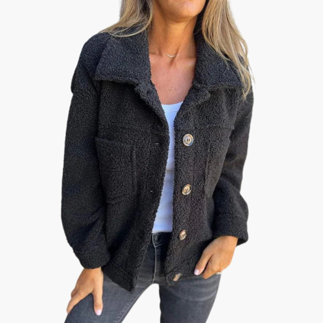 Women's wool blend jacket with notched collar, button-front closure, patch pockets, structured cozy fit