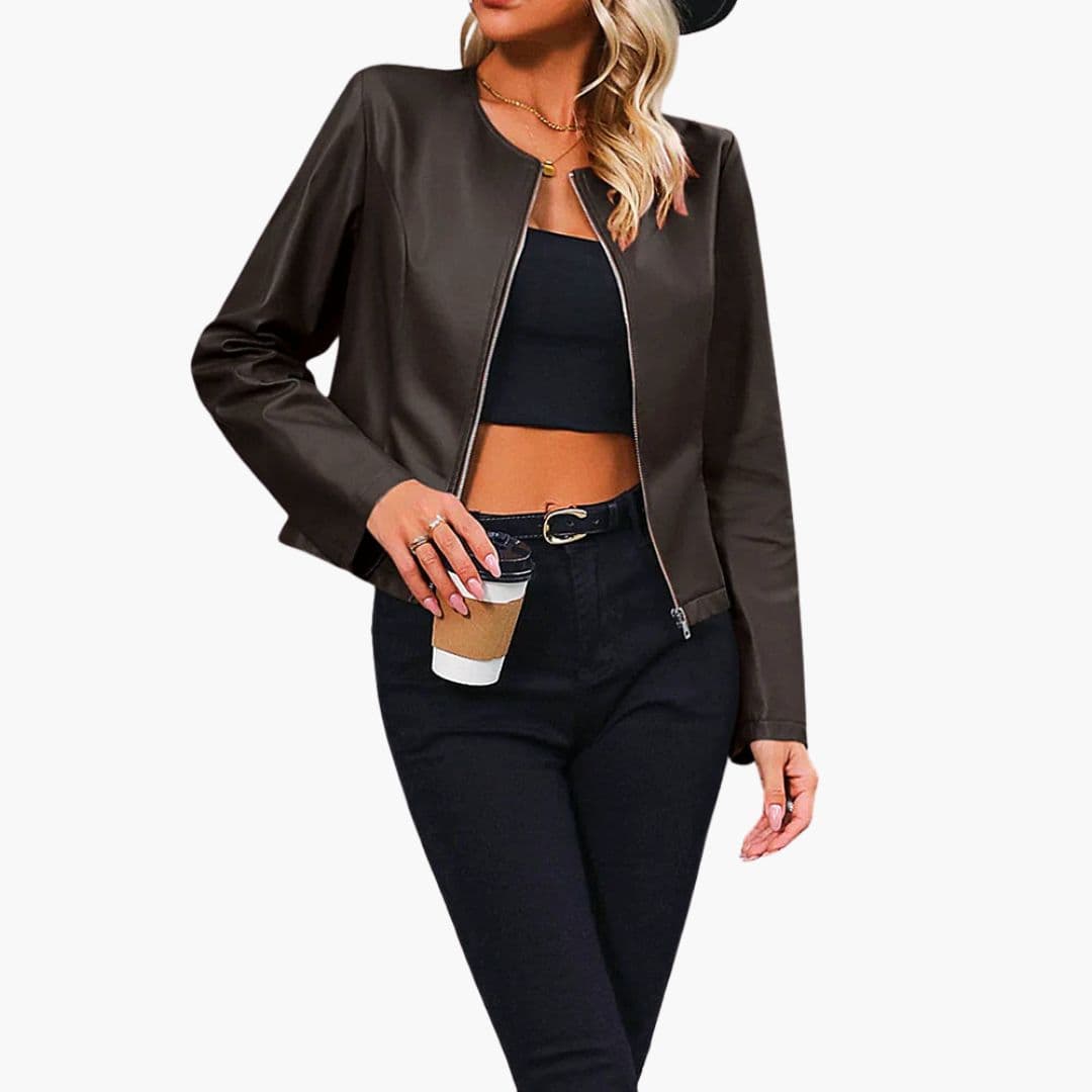 Women's mid-thigh zip-front jacket with round neck, long sleeves, minimalist silhouette