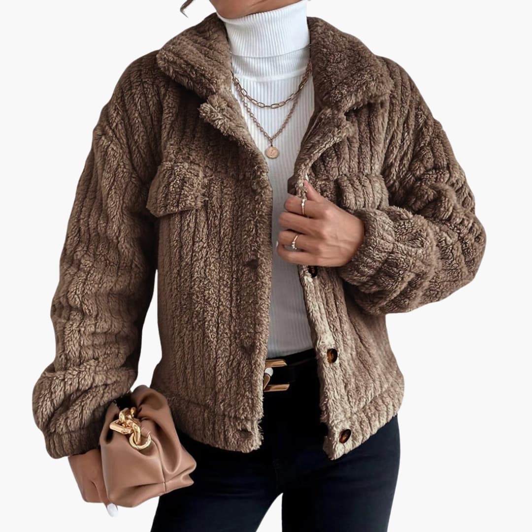 Women's short plush-effect jacket with button closure, pointed collar, and chest pocket for chic everyday style