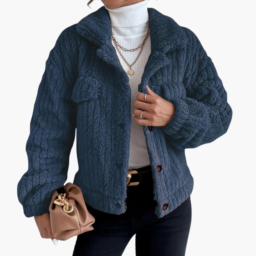 Women's short plush-effect jacket with button closure, pointed collar, and chest pocket for chic everyday style