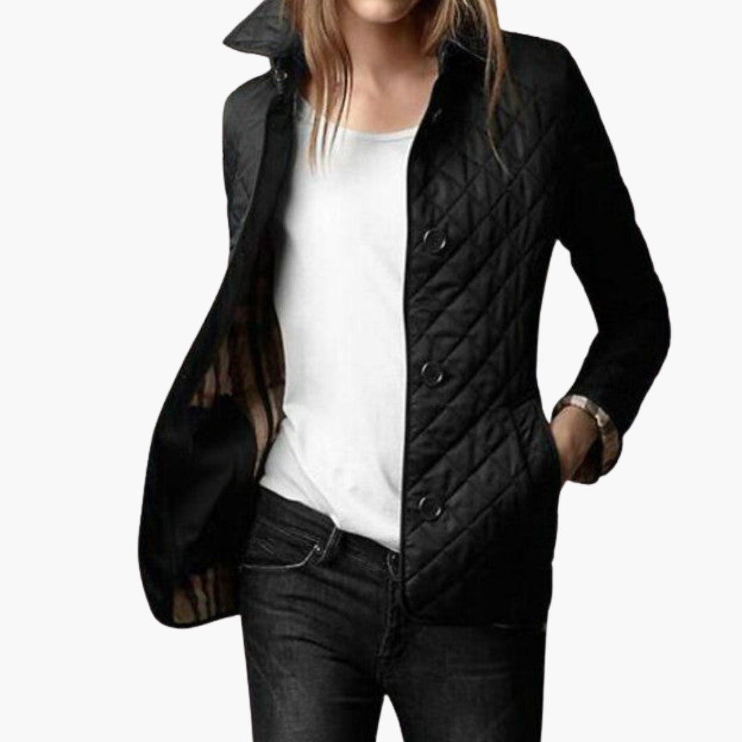 Women's quilted jacket with button closure, foldable cuffs revealing contrast lining, structured collar