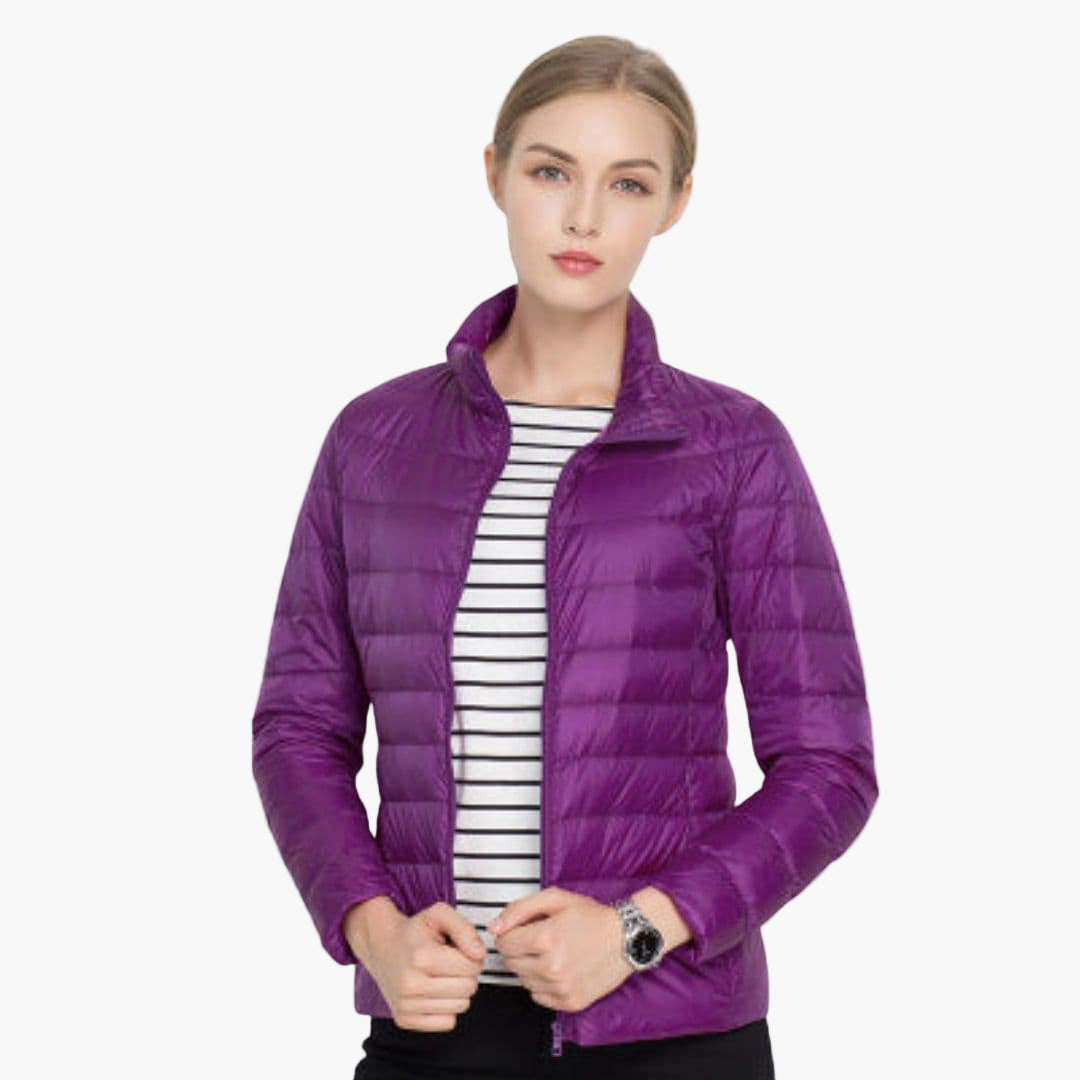 Women's quilted jacket stand-up collar front zip closure streamlined silhouette everyday warmth