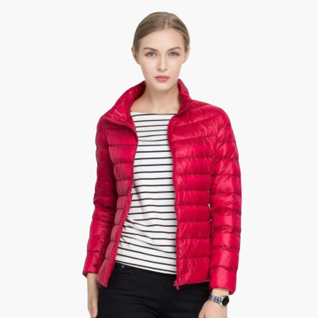 Women's quilted jacket stand-up collar front zip closure streamlined silhouette everyday warmth